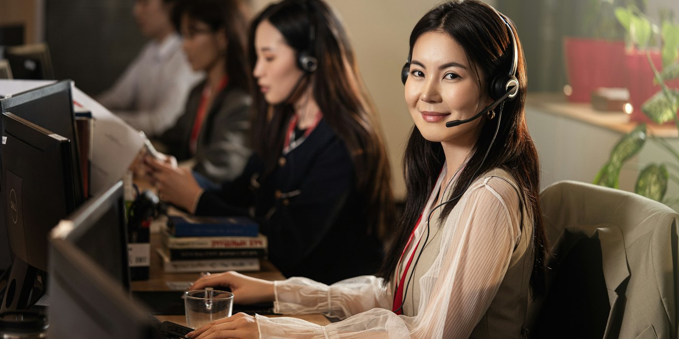 A contact-centre agent wearing a headset